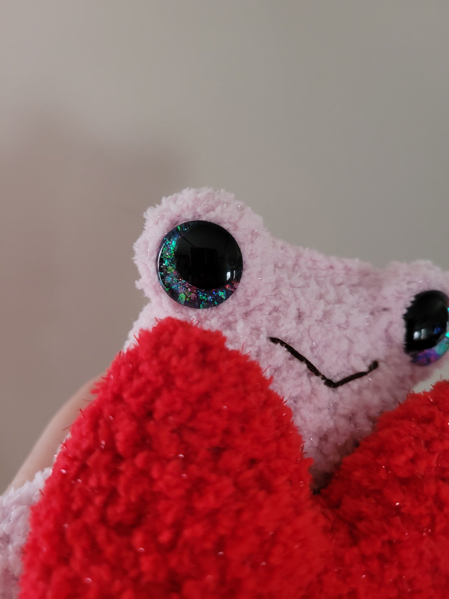 LuvKnotz Medium Pink Fuzzy Frog with Red Bow Handmade Crochet - Soft Chenille Yarn, Approx. 10" Long, Purple Blue Glitter Eyes, OOAK stuffed animals